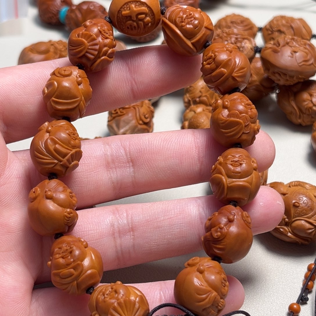 橄榄核吊坠户**?小籽财神