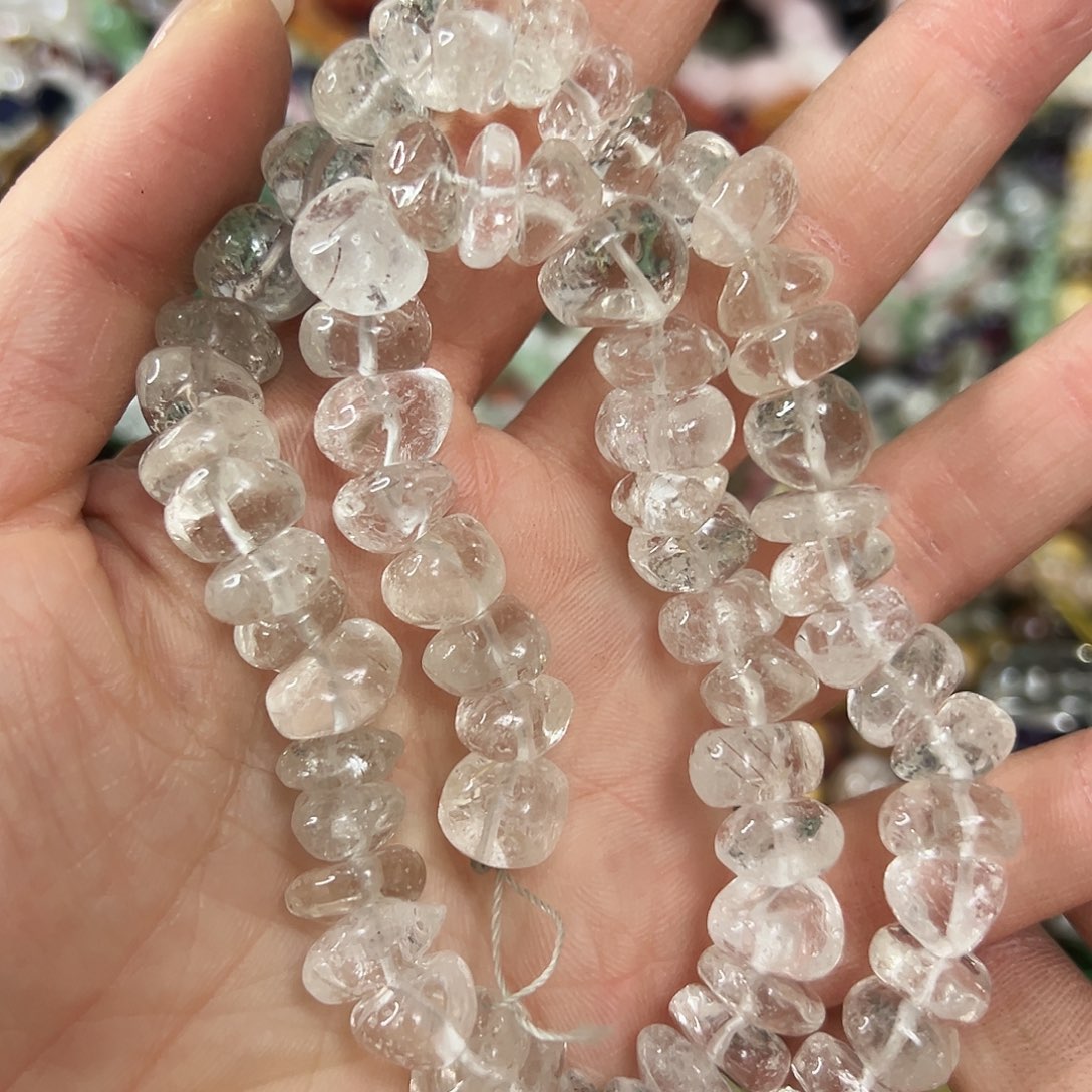 玛瑙/玉髓未镶嵌珠宝半成品，卡11左右浅茶晶随形一条