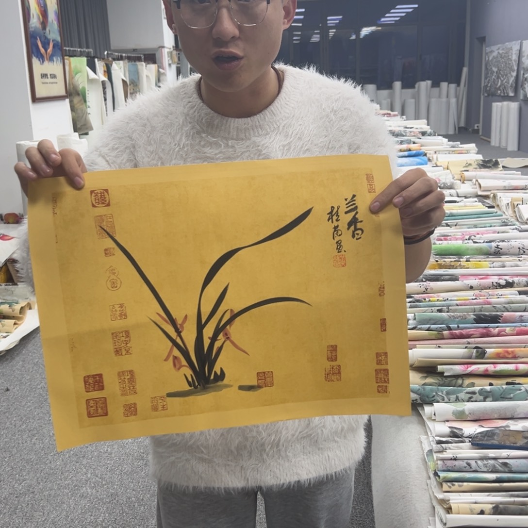 国画卖字画的小男孩