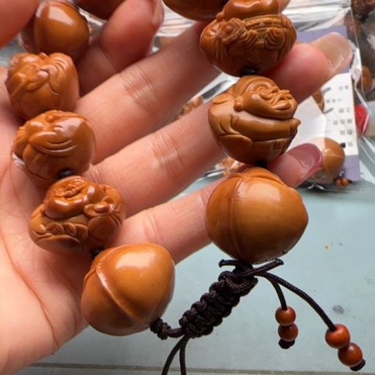 隔***？橄榄核吊坠橄榄雕工艺的