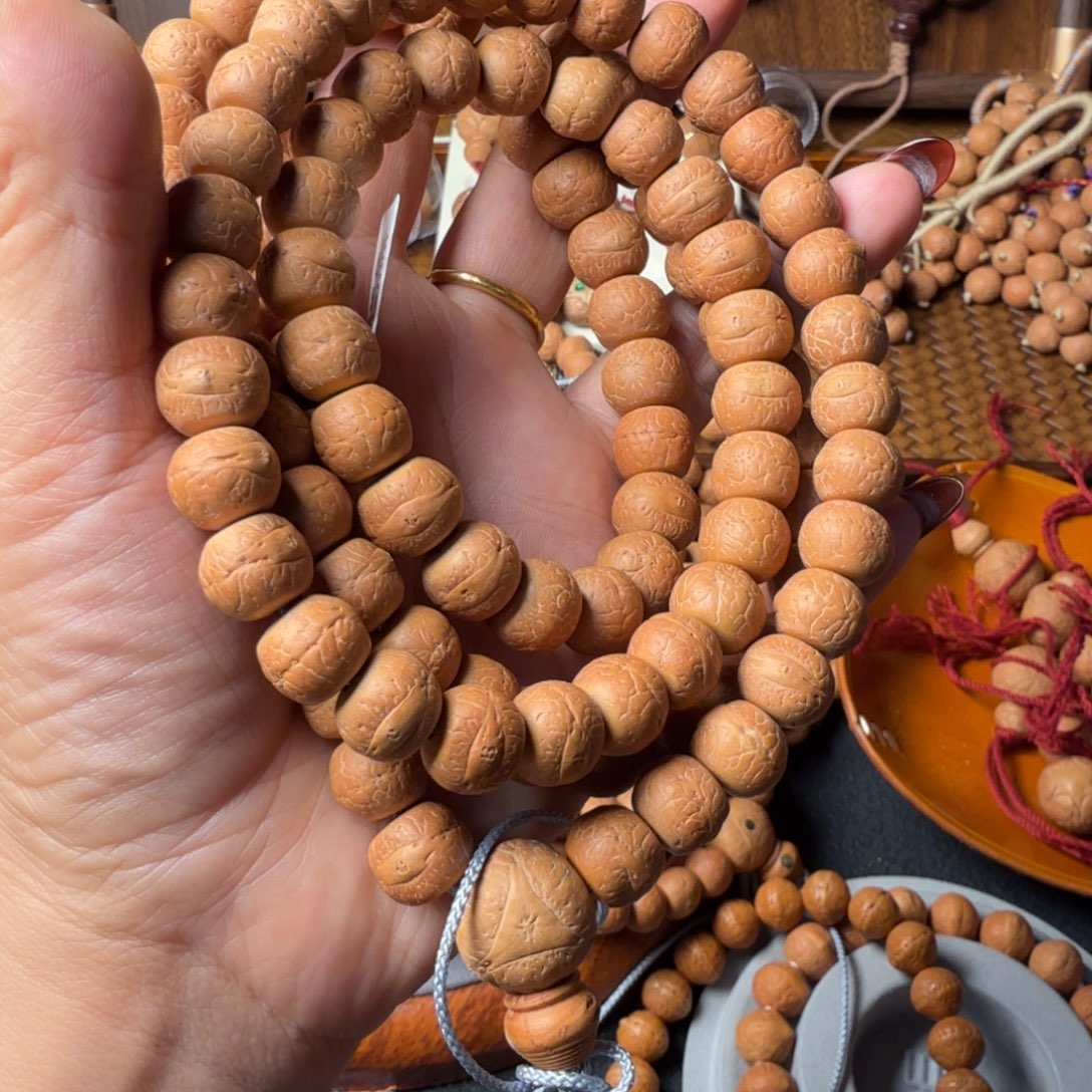 嗷***。凤眼菩提把件精工藏切110颗