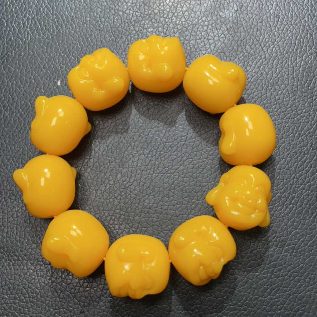  782  鸡油黄佛头手串