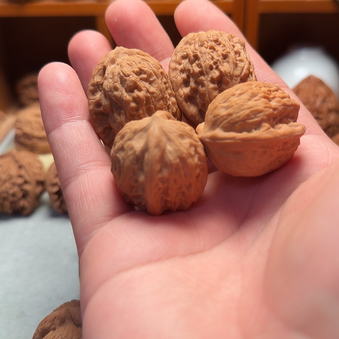 B***n文玩核桃把件原树野核火麒麟红玉套餐