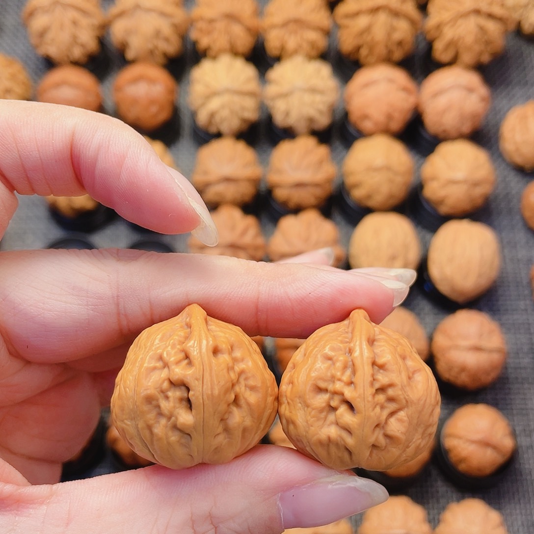 文玩核桃把件苹果元宝