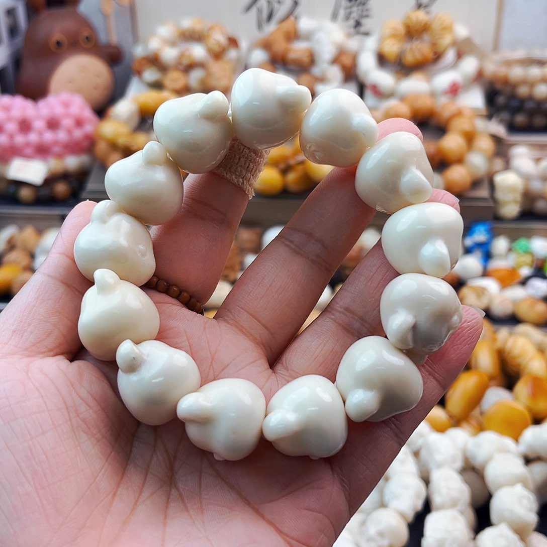 菩提根/象牙果手串微微瑕熊头九折