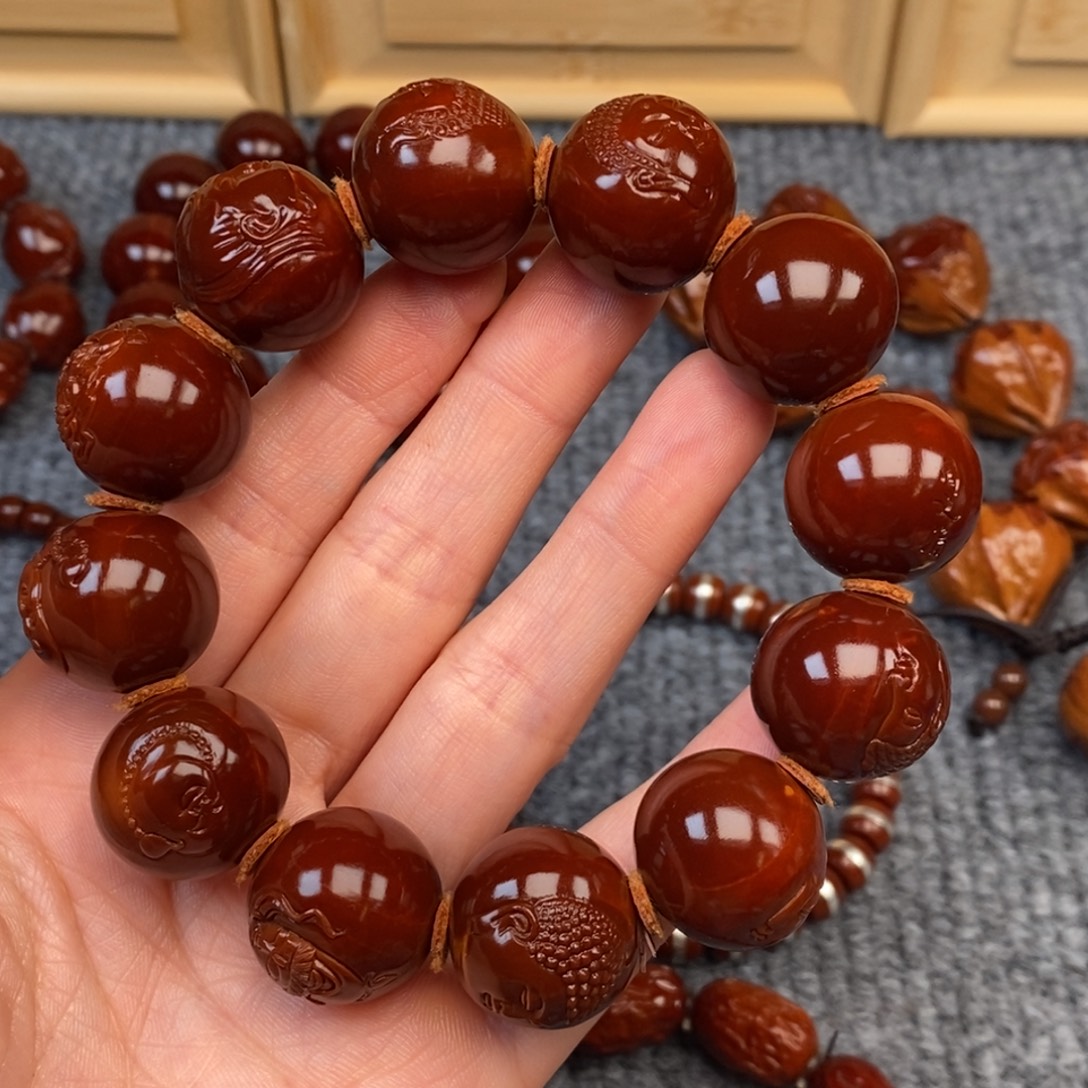 叫***E橄榄核手串/手链万佛光柱19