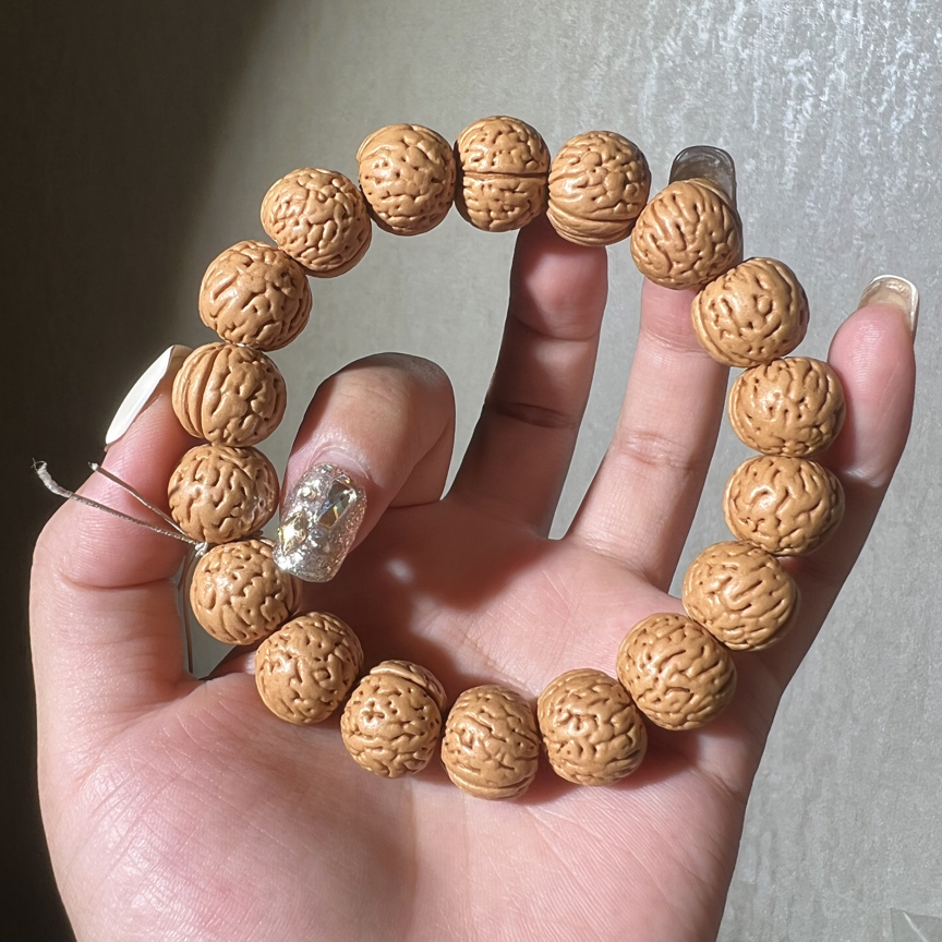 油皮金丹15+y桃核手把件