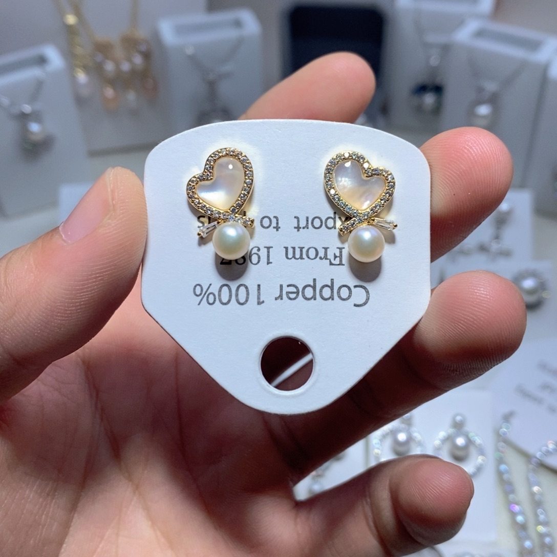 淡水珍珠银S925镶嵌耳饰