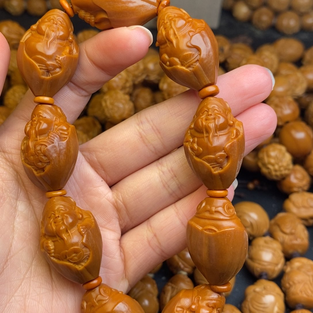 橄榄核吊坠包衣财神1.7+