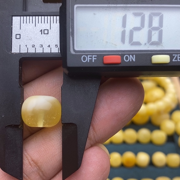 琥珀未镶嵌裸石39花12.8*9.9喇叭口瑕