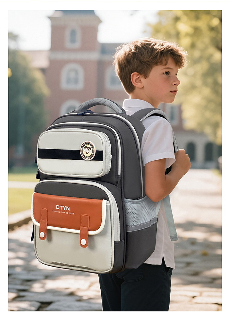 小学生1 - 6年级减负护脊轻便大容量双肩书包潮酷超轻透气