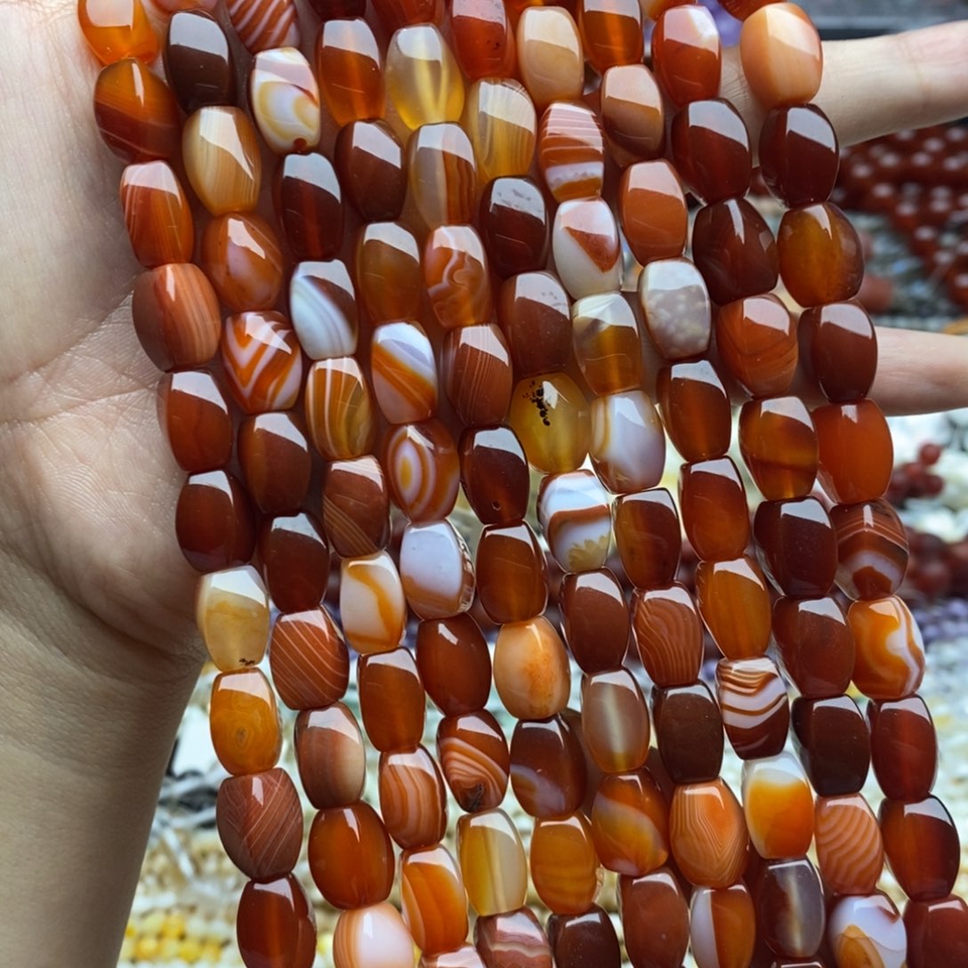 玛瑙/玉髓未镶嵌珠宝半成品一条装纯天然蚕丝红玛瑙扭扭桶珠8×12