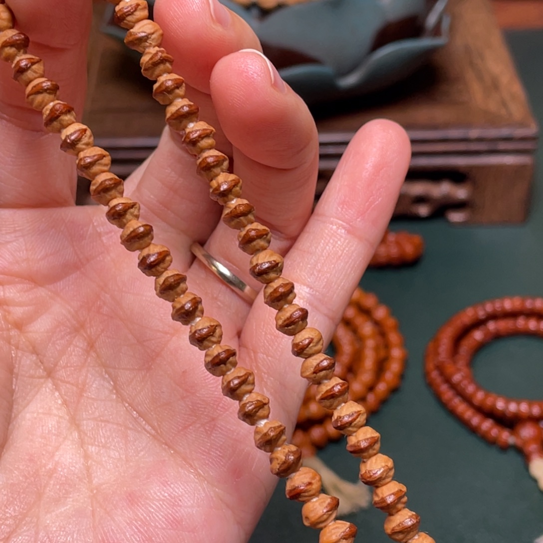 柏香籽/百香籽吊坠小凤眼手持