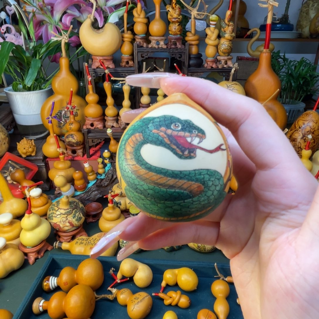 啊**.手把蛇形针刺葫芦