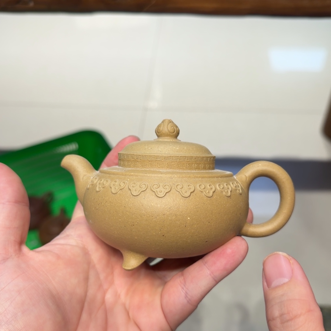 …***.茶杯紫砂风釉的壶