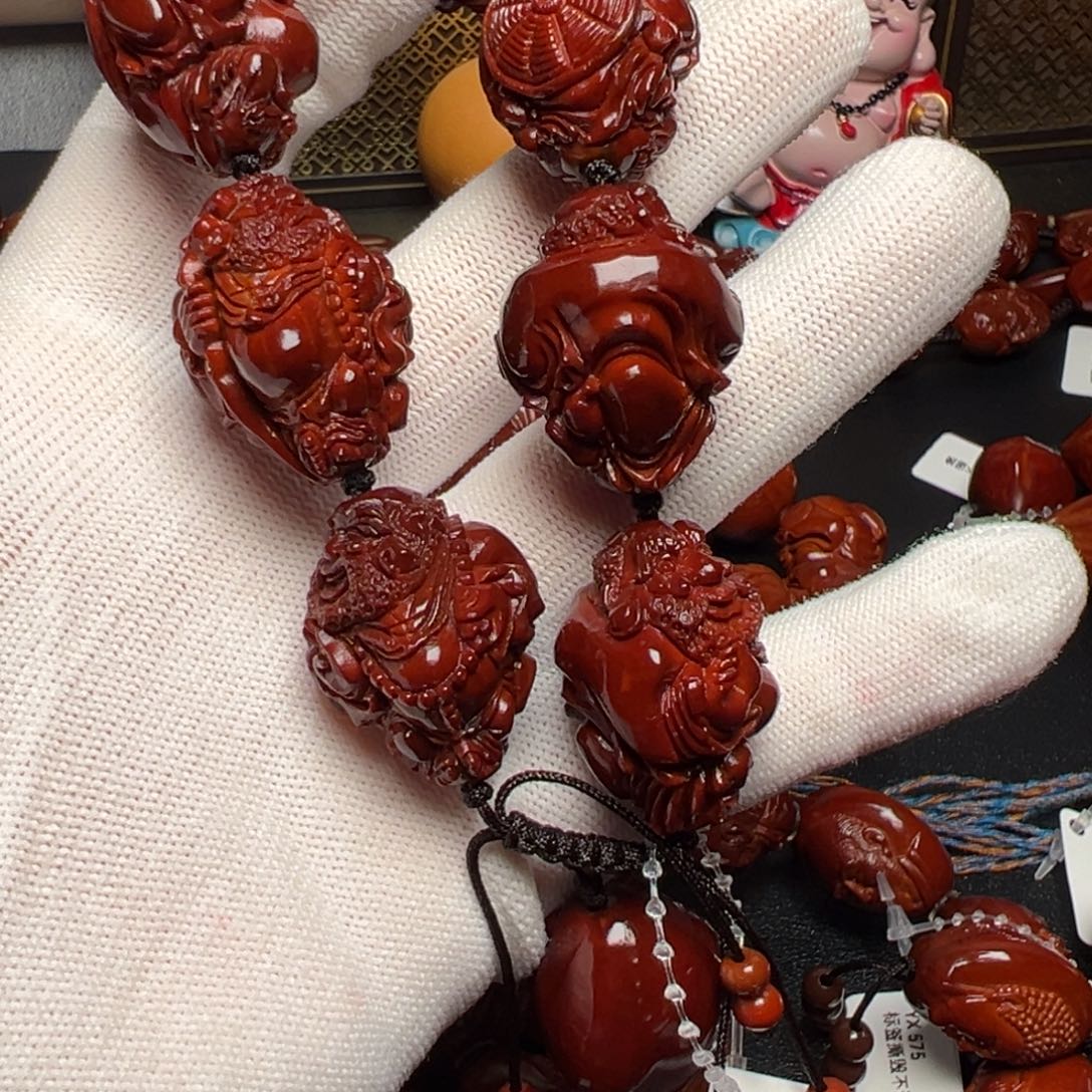 嚣***鱼橄榄核吊坠橄榄核？