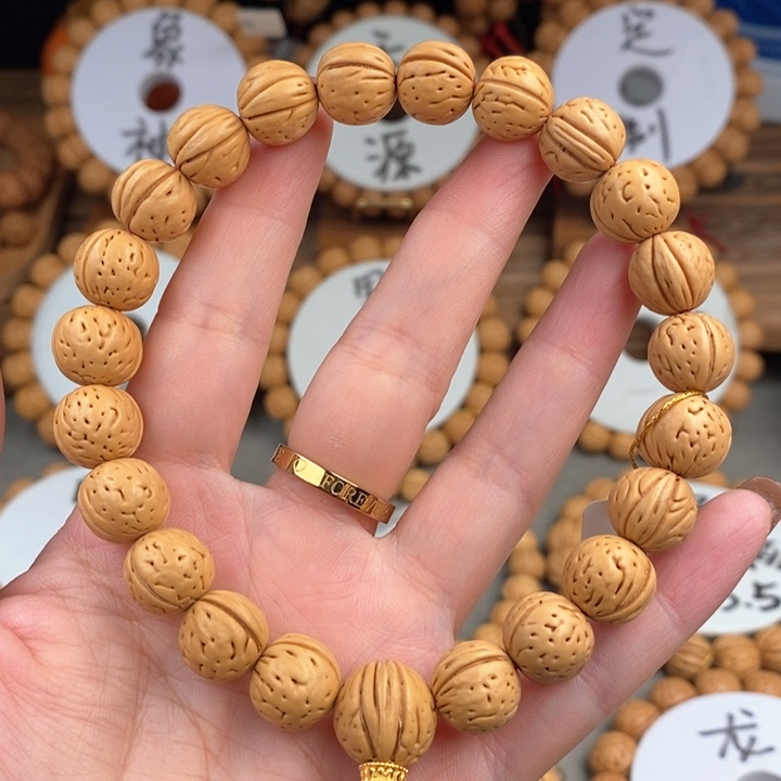 桃核手串金蝉子12.5s抛光板误差0.5