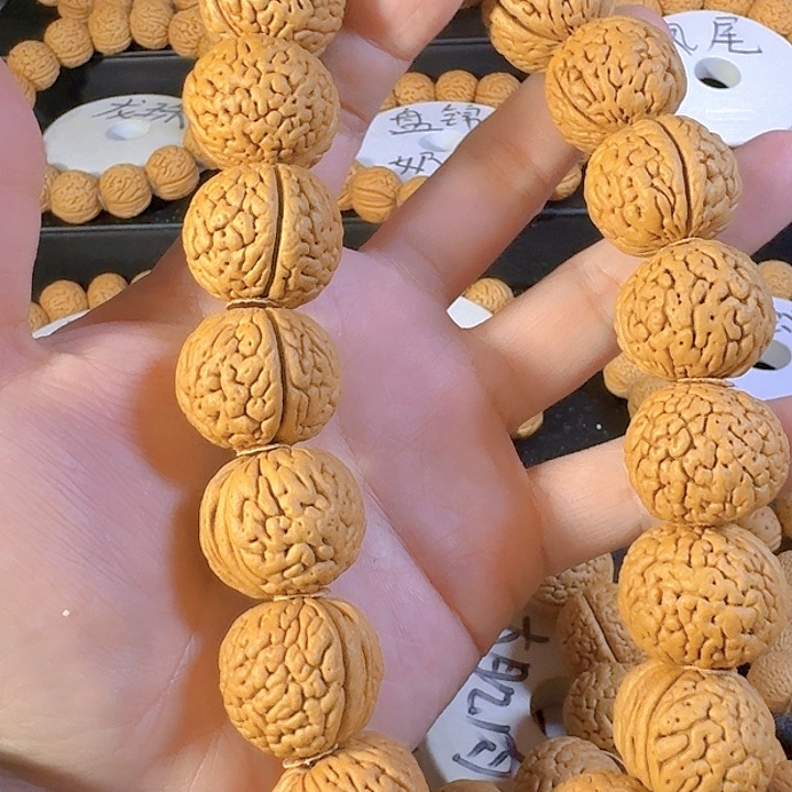 2***0桃核吊坠肥齐肌肉手持