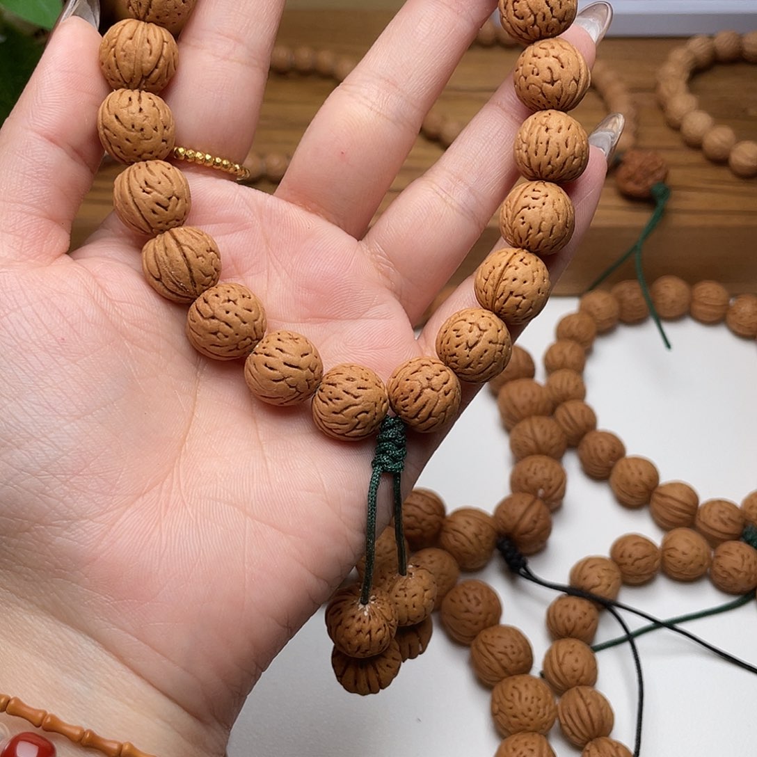 相***好14野生红皮肥脐桃核手持