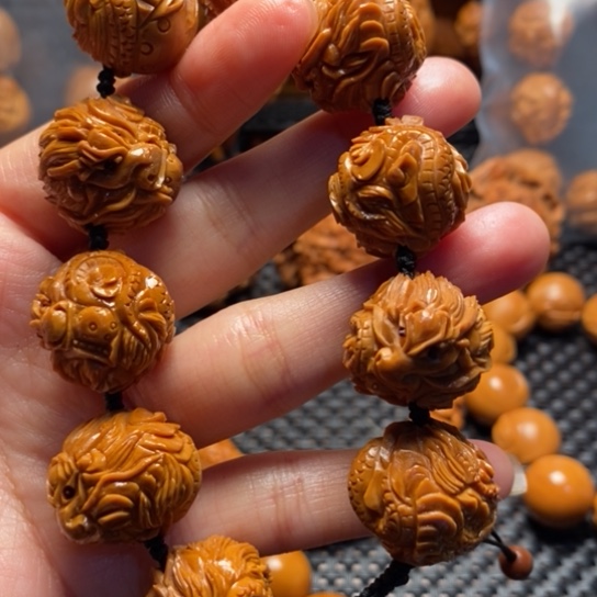 橄榄核吊坠幸****?九龙手串