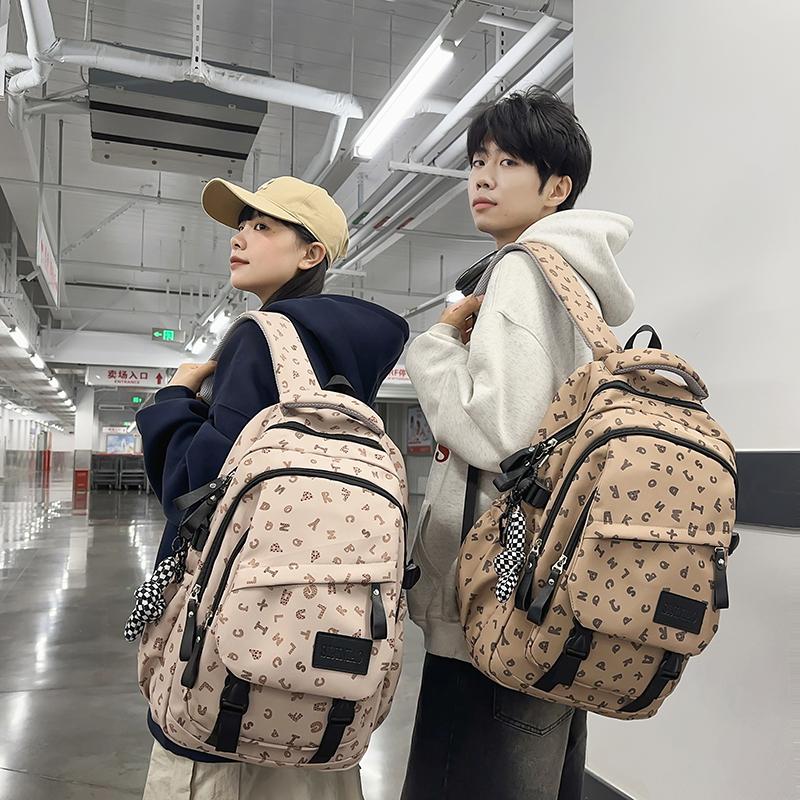 大学生书包初中女生大容量高中学生背包小学生高颜値简约双肩包男