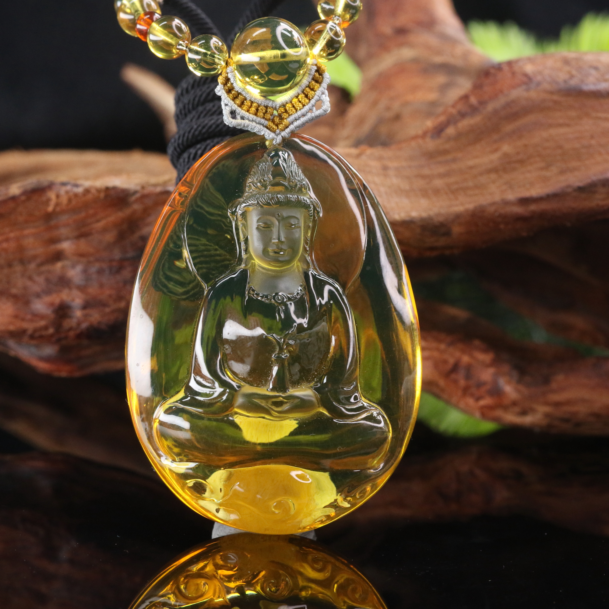 12琥珀观音挂件/000669北京中保拍卖