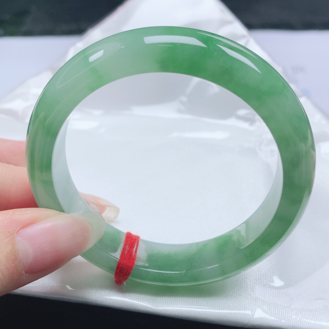 雷***生翡翠未镶嵌手镯翡翠52.7冰润果阳绿正圈