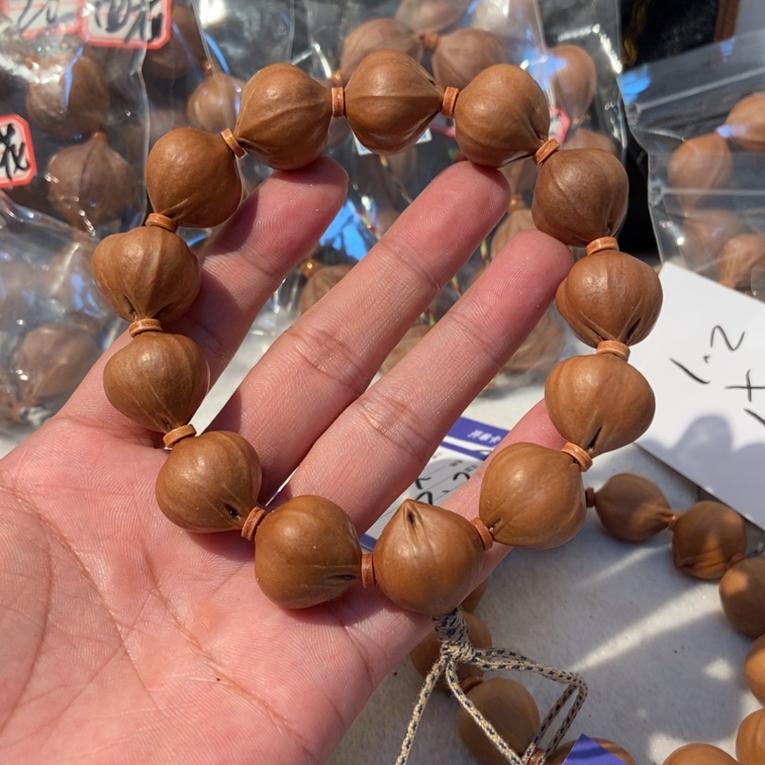 人***何吊坠橄榄核橄榄橄榄