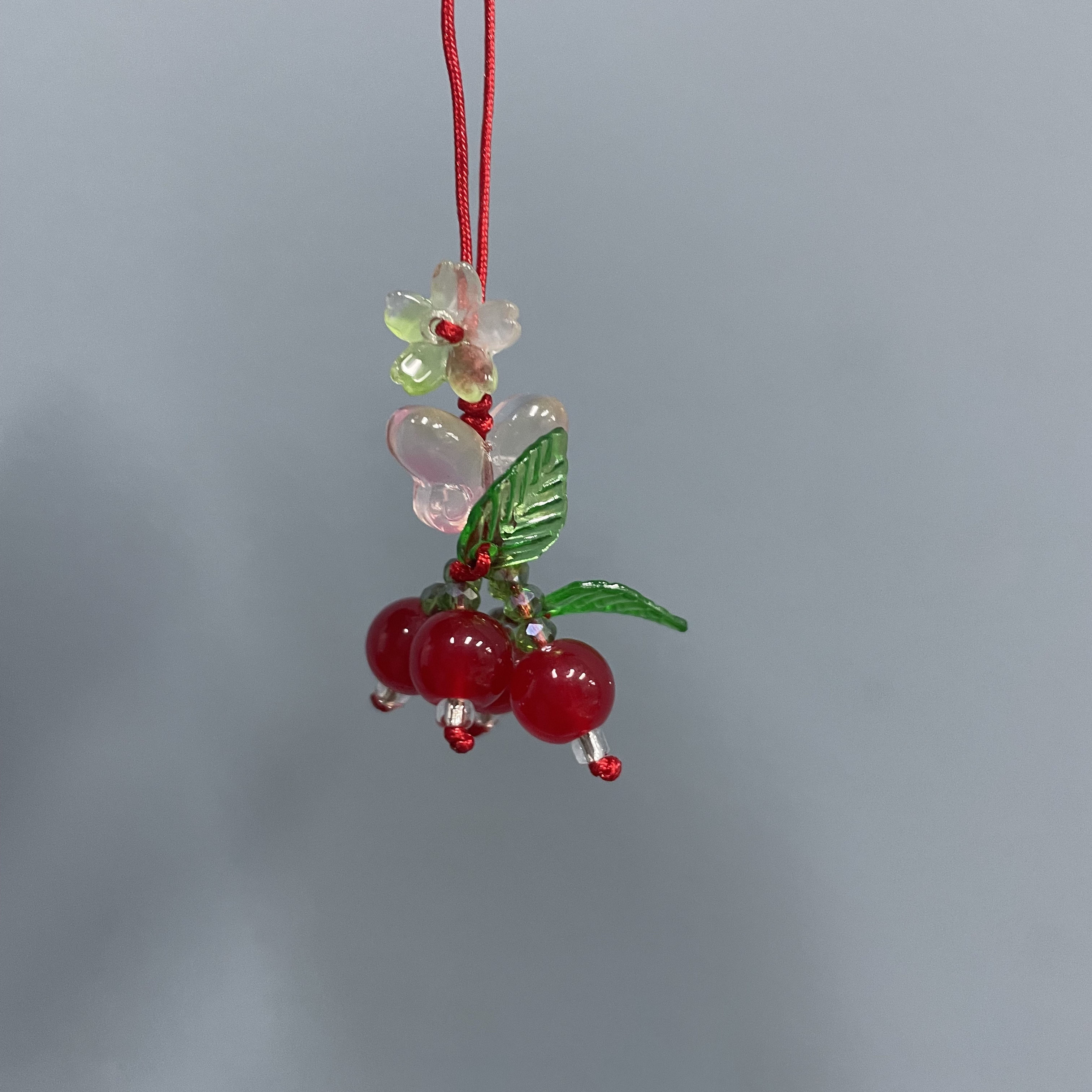 绳款红色提溜手机坠E315