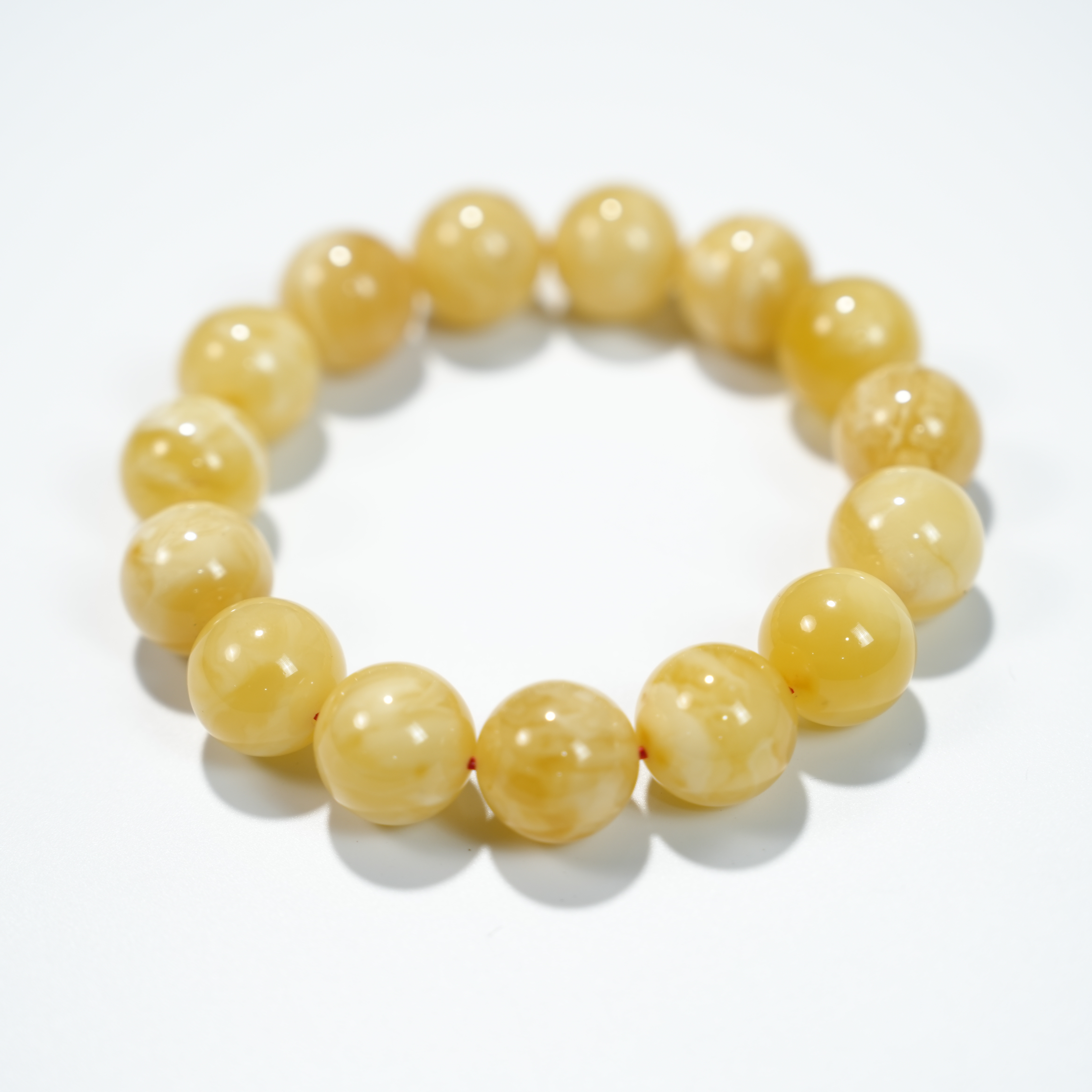 蜜蜡1.5*15颗单圈手串35020187