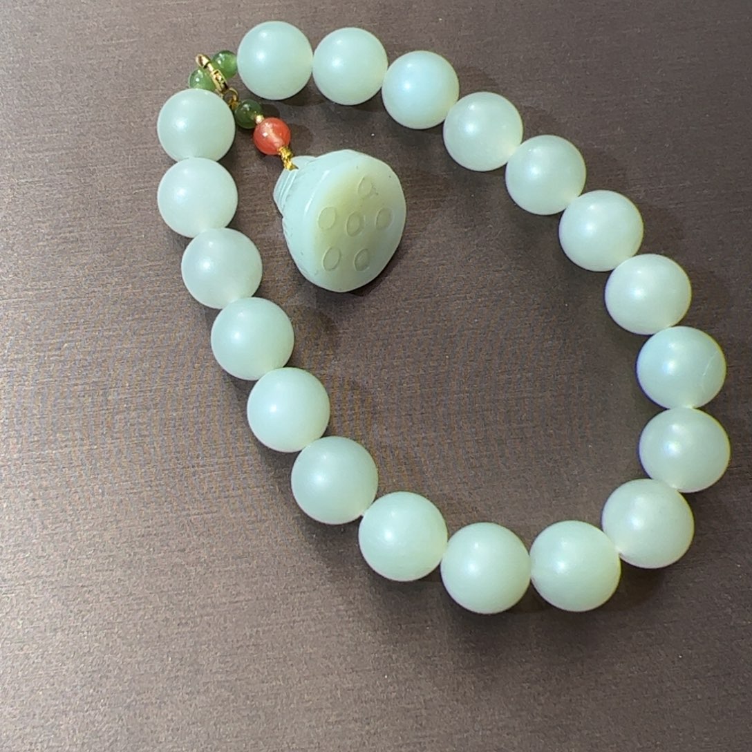 未镶嵌和田玉挂件流**岸10mm子青白