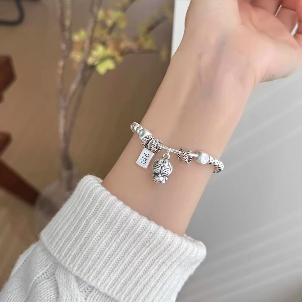 哆啦A梦心想事成手链女叮当猫手工编织银珠礼物手饰手链-A129