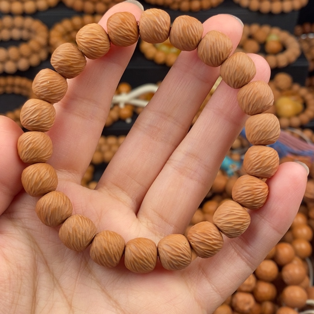 猴头核桃手串瑕疵漏眼云锦无售后