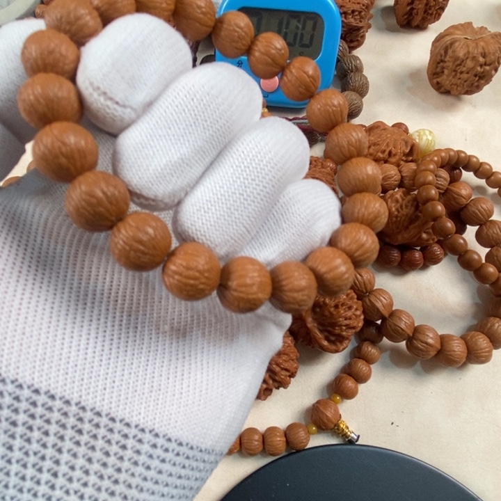 刘***子猴头核桃吊坠三维同尺凤羽12小