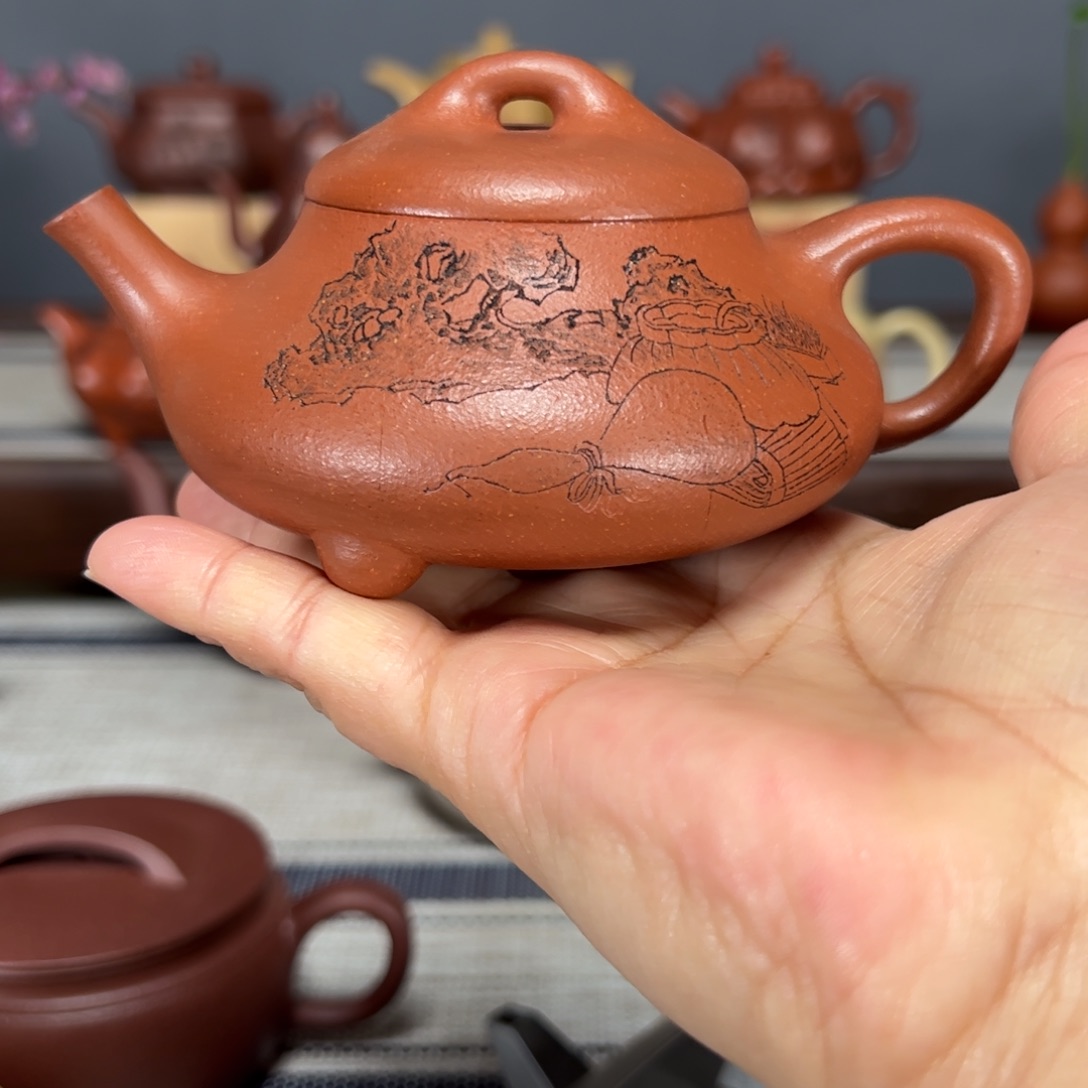 紫砂茶壶见瓢红降坡