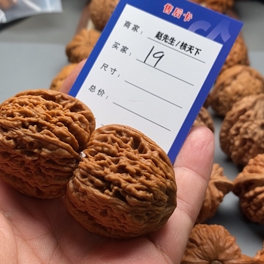 露***蓝桃核吊坠南疆石狮子头