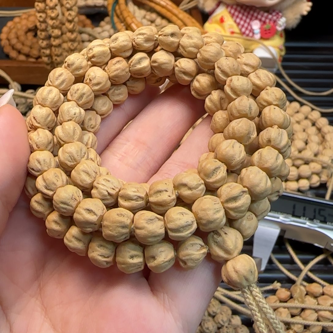 爱***己柏香籽/百香籽吊坠