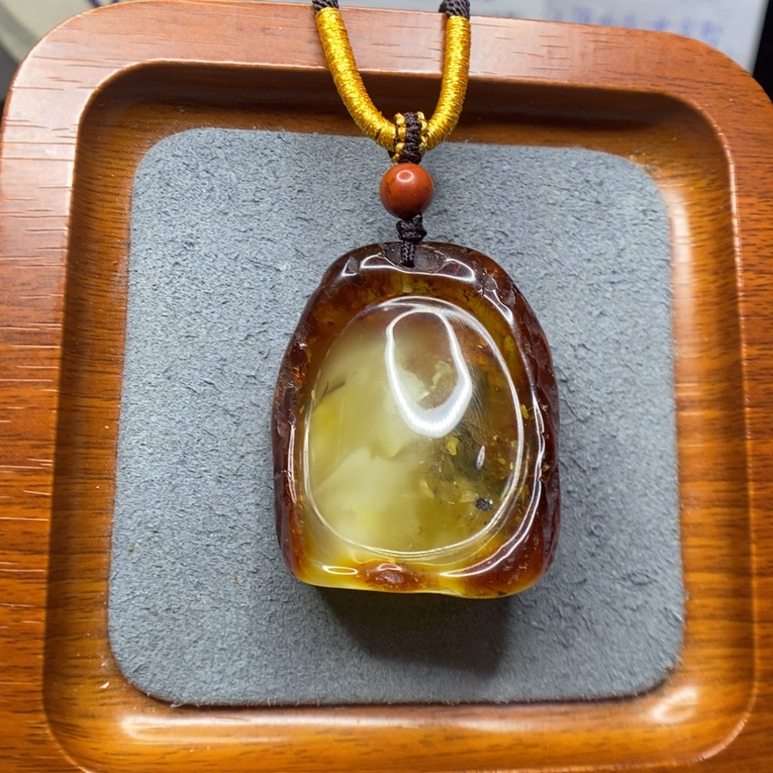 石***头蜜蜡未镶嵌颈饰郎