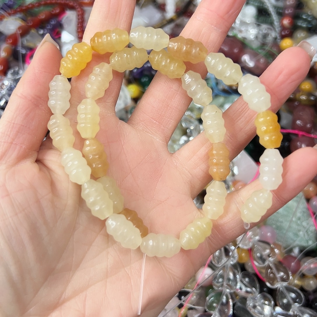 玛瑙/玉髓未镶嵌珠宝半成品，金丝玉云朵珠一条