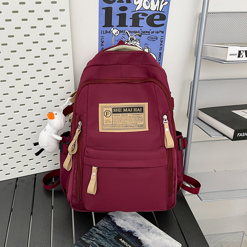 梓文超减负儿童书包春游中小学生出行研学包初中大容量学生双肩包