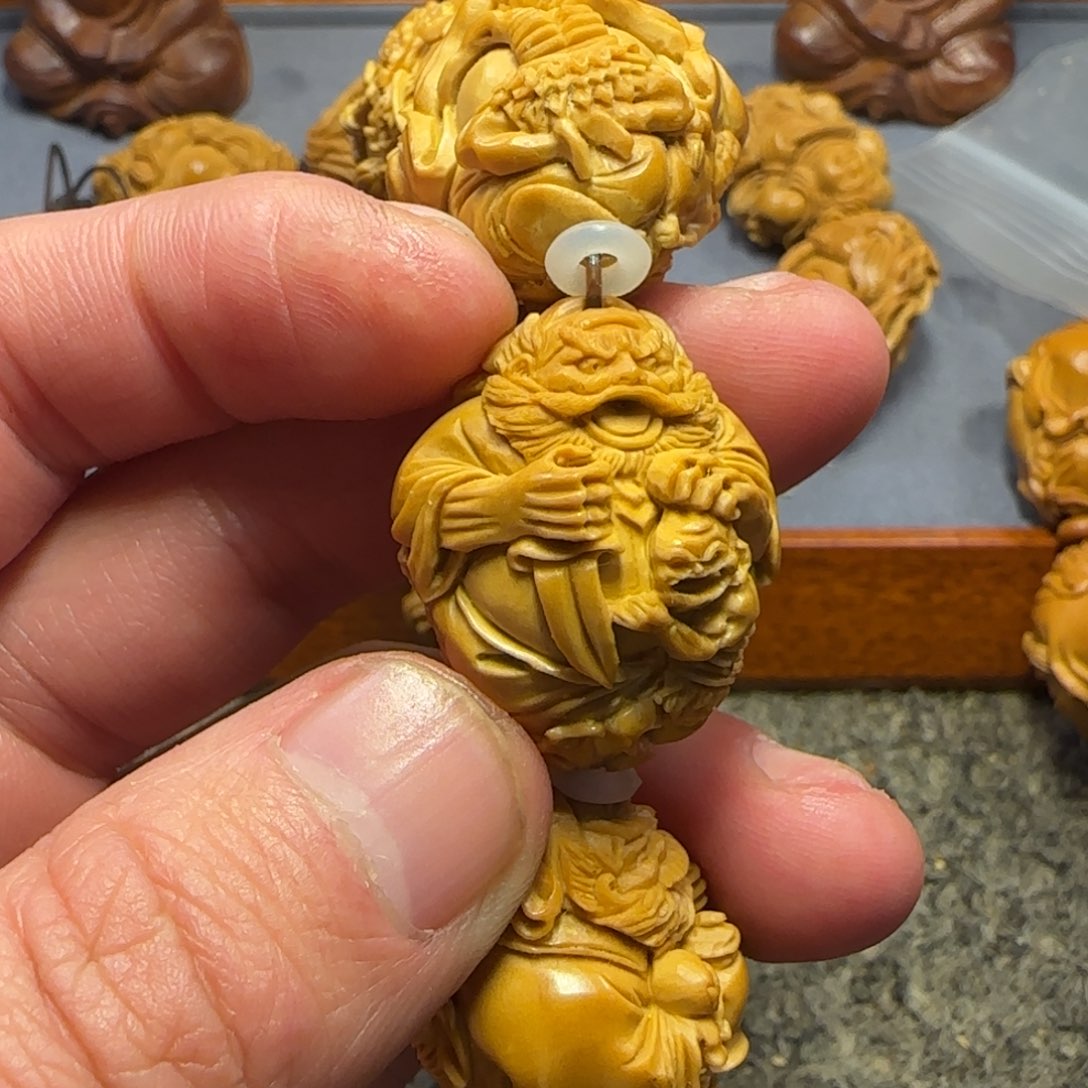 橄榄核吊坠爱***猫……………………