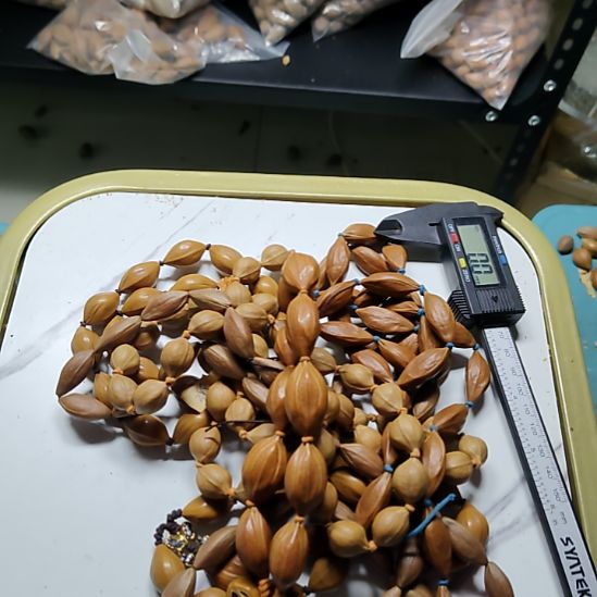 ****️橄榄核吊坠四花手持