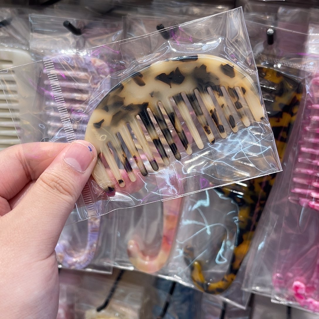 醋酸非金属浅豹纹半圆梳