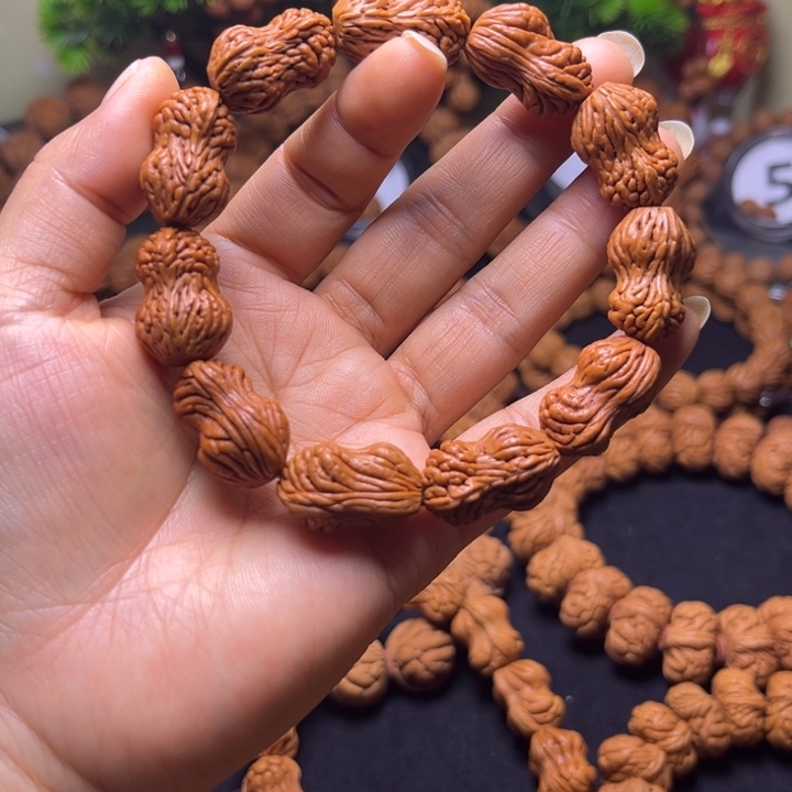 1***6吊坠桃核花生手串