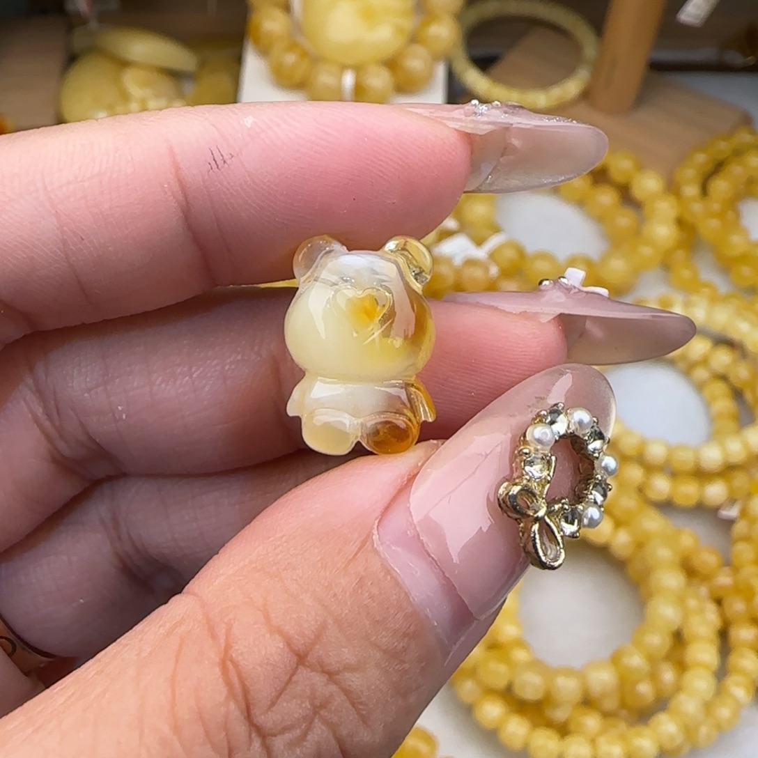 希***m蜜蜡未镶嵌裸石金绞白小熊