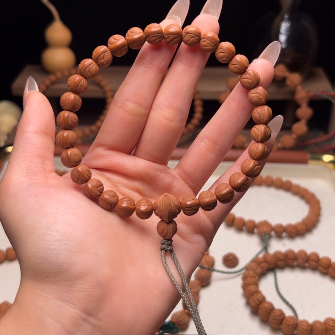 李****木质类陕西龙纹桃核8.6