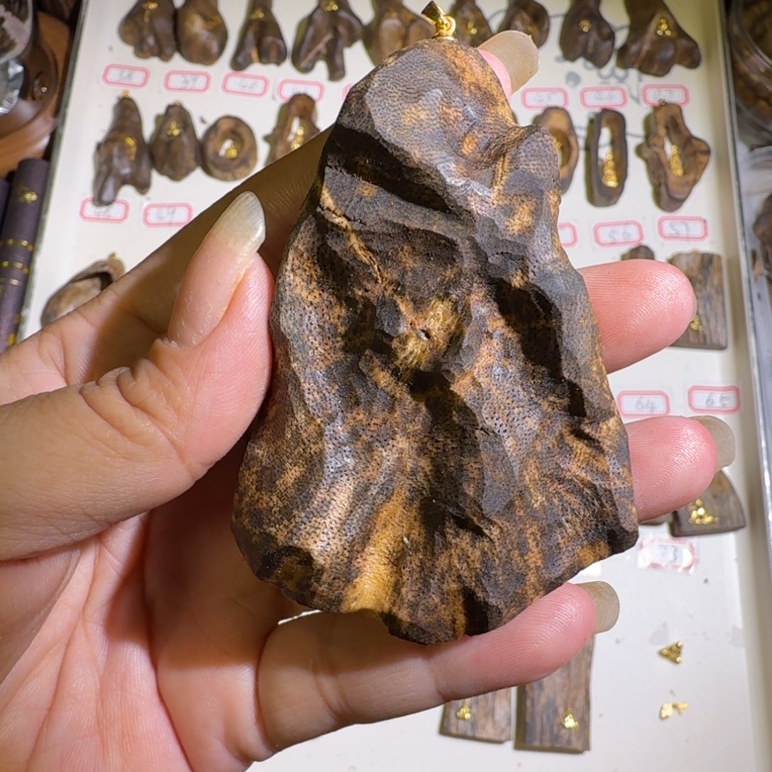 两***力奇楠沉香包头吊牌．