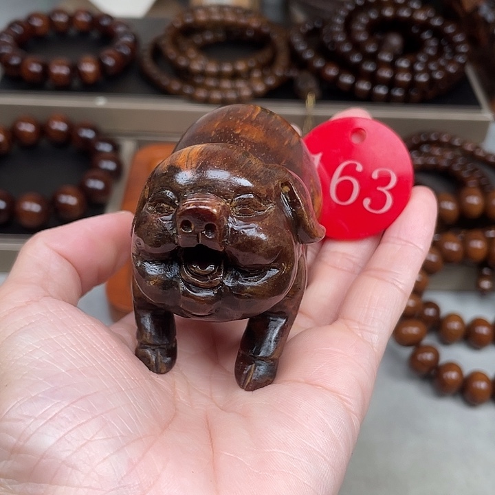 贡木其他红冰玉猪手把件