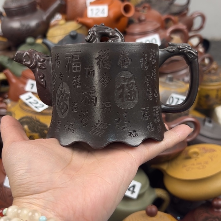 紫砂茶壶嘴磕碰了