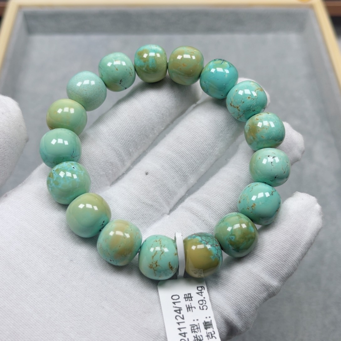 绿松石挂件未镶嵌笑**画